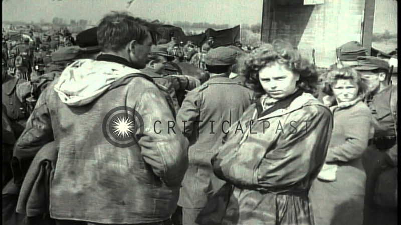 American soldiers rest after the battle at the Tangermunde bridge in Germany Stock