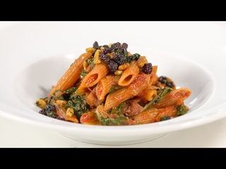 Red Lentil Penne Pasta with Chorizo, Sofrito, Pine Nuts and Currants