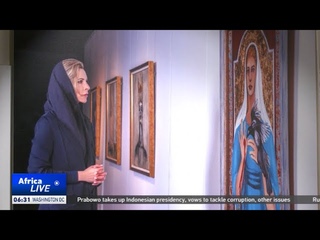 Moscow exhibits Gaddafi daughter's art to remember her father
