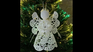 Небольшой ажурный ангел связанный крючком. A cute little angel, crochet.